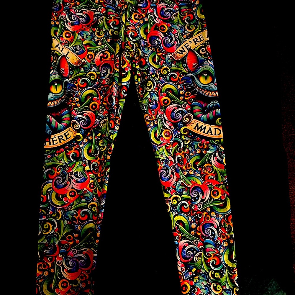 These are custom made Cheshire Cat Alice in Wonderland leggings.